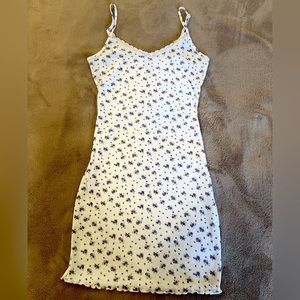 Size small Shein, dress white with purple flowers.